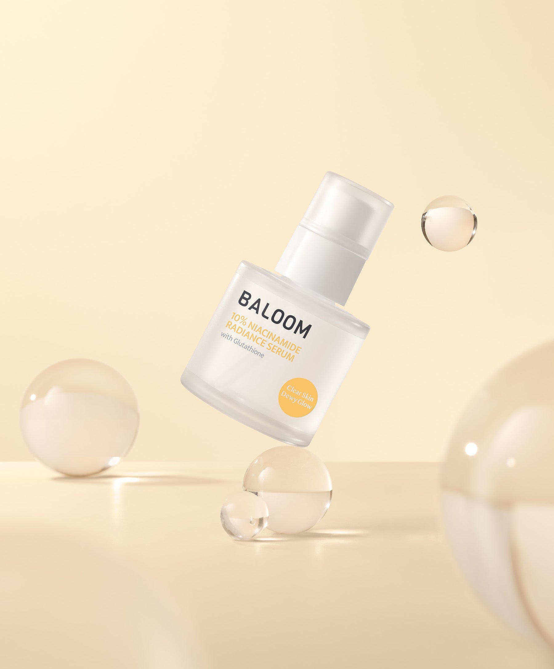 Skincare bottle labeled 'BALOOM' with bubbles on a beige background